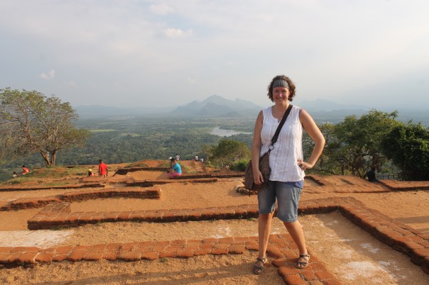 So, I’m afraid of heights, but I’ve figured out a way to conquer it. Be exhausted, having already climbed many things that day, so that you’re so tired by the time you reach this stairway from Hell, you actually couldn’t care less any more if you fell to your death or not. So, I’m afraid of heights, but I’ve figured out a way to conquer it. Be exhausted, having already climbed many things that day, so that you’re so tired by the time you reach this stairway from Hell, you actually couldn’t care less any more if you fell to your death or not. Proof I made it to the top of Sigiriya! My leg is at a weird angle, methinks, b/c (a) I was having a low blood sugar moment due to not having eaten since breakfast (and this was 5pm) and (b) not having enough water with me, therefore dehydrated and seriously considering stealing the water out of the hands of the tiny child monks nearby.