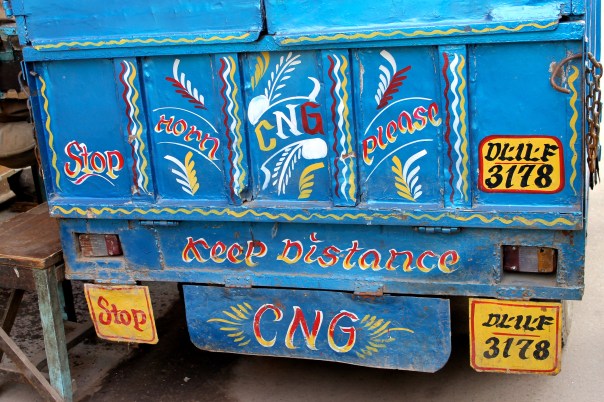 Many trucks have paintings like this on their rears asking people to honk, as a safety precaution 
